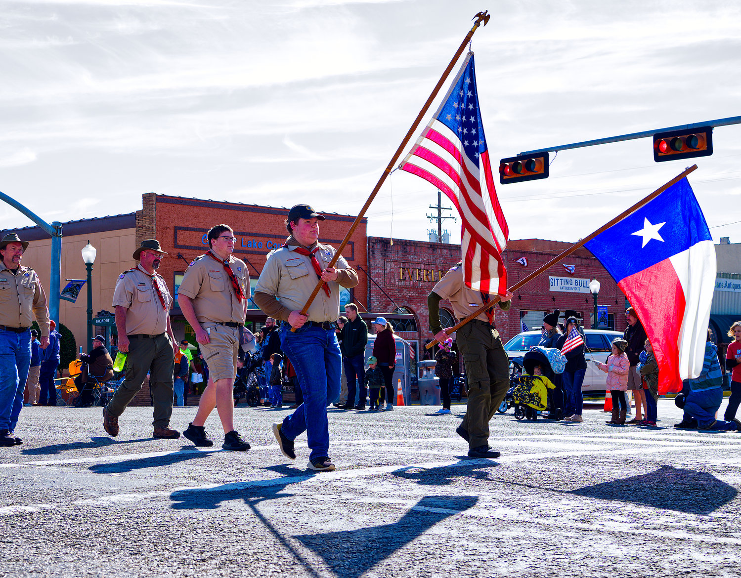 Bearing the colors for the recent Veterans Day parade in Mineola were members of Boy Scout Troop 385.